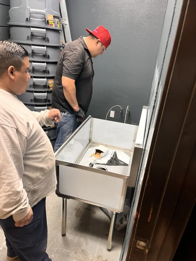 Commercial plumbing and sink installation in West Forest